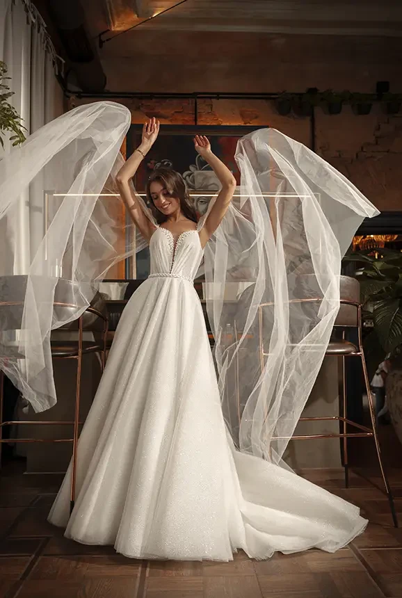 Tulle bridal gown with plunging v-neck