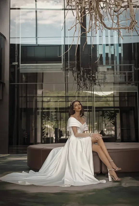 Bridal gown with off the shoulder sleeves